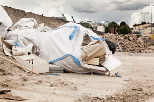 Homeowner discussing loft clearance with professional team in Penge